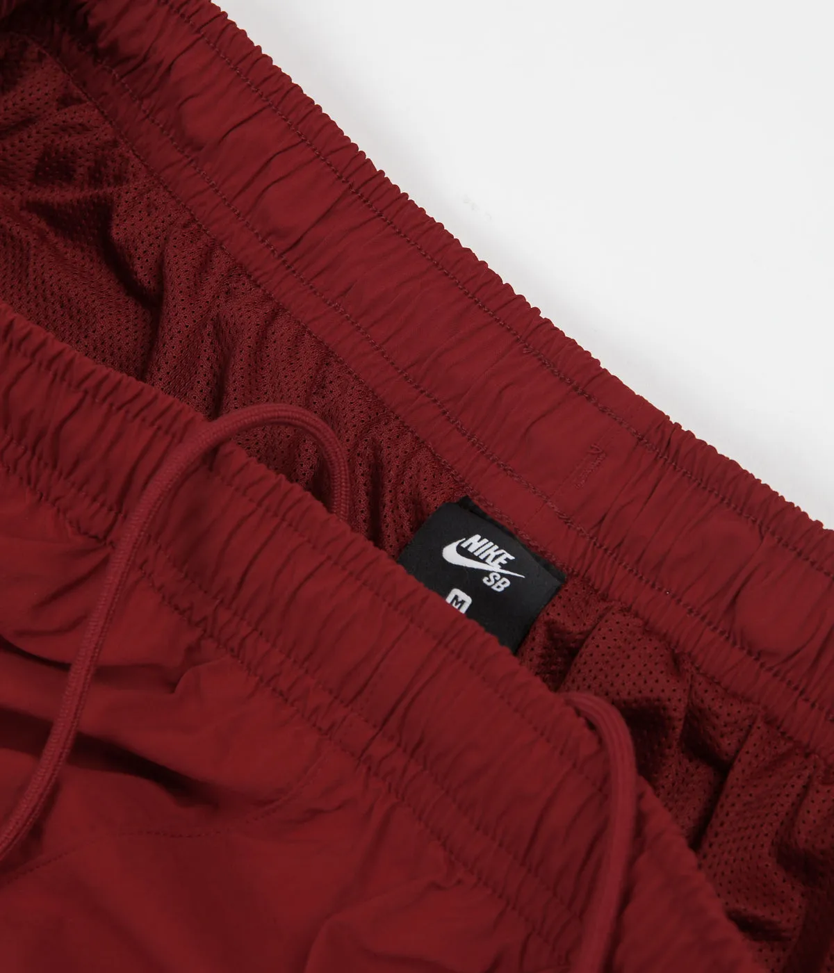 Nike SB Swoosh Track Pants - Team Crimson / Obsidian / Obsidian