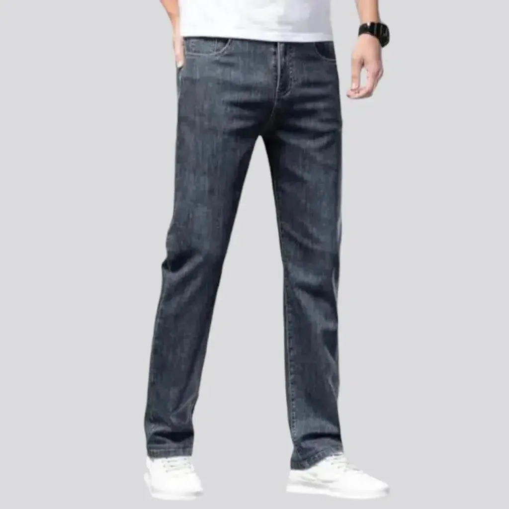 Whiskered men's mid-waist jeans