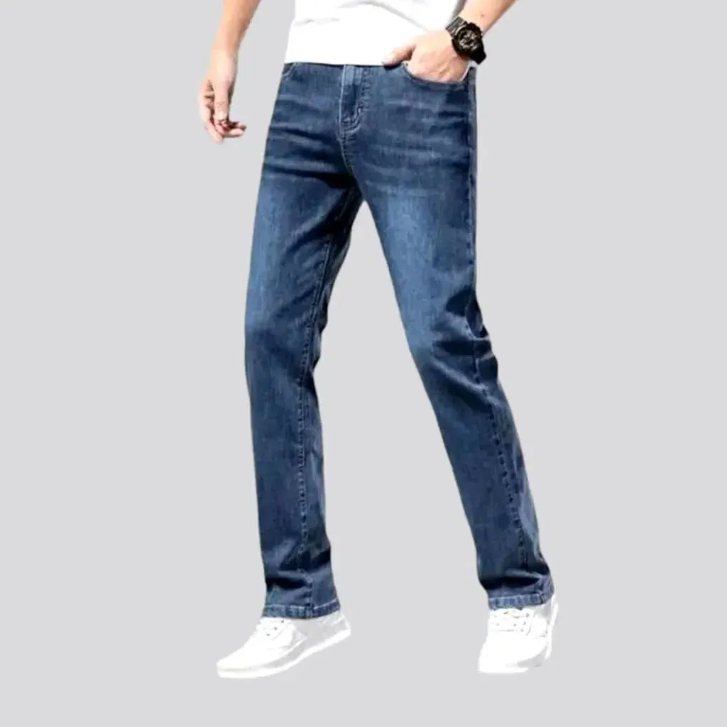 Whiskered men's mid-waist jeans