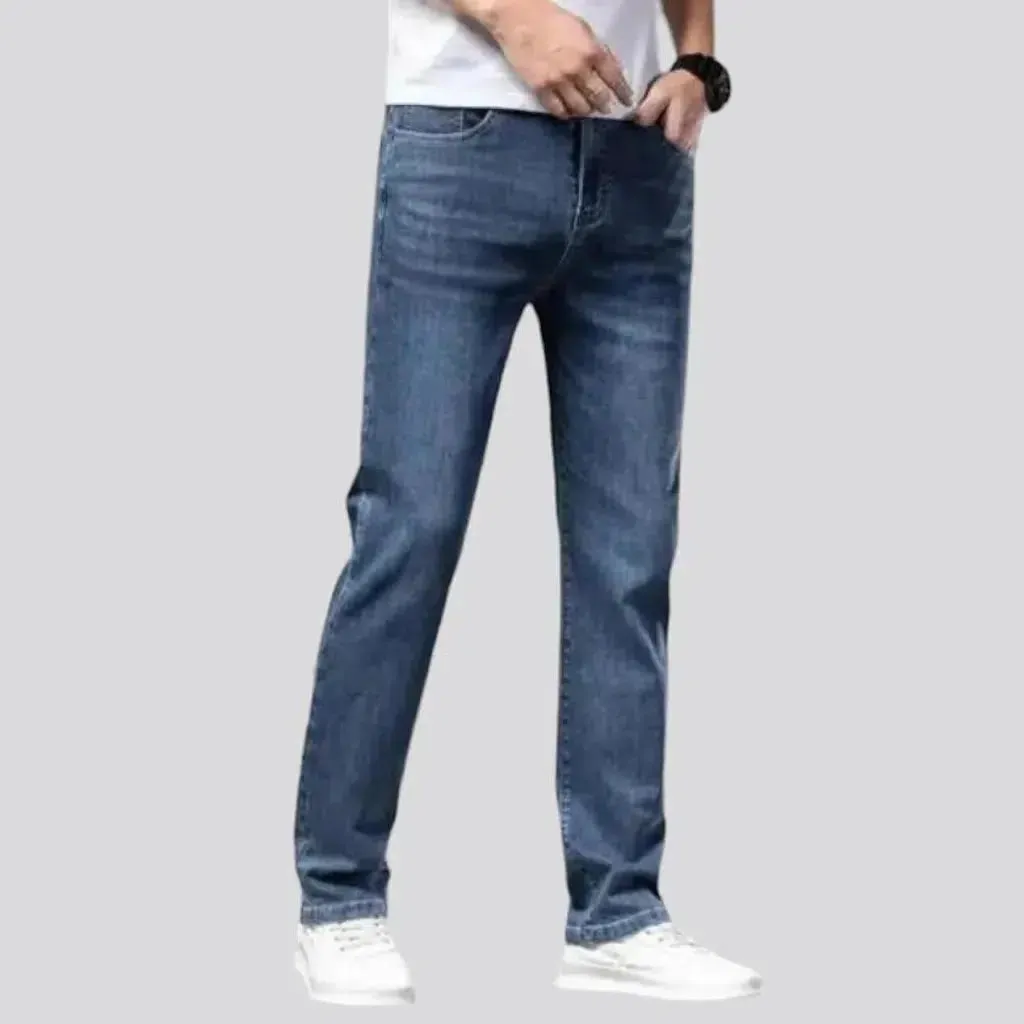 Whiskered men's mid-waist jeans